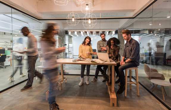 Agile team works in office with moving environment