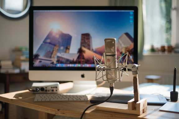 A screen with microphone in front