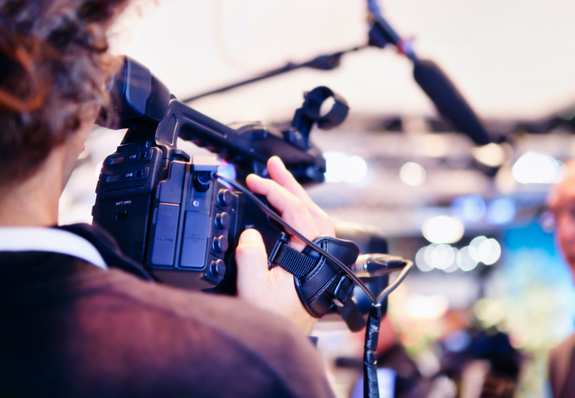 Cameraman filming an event