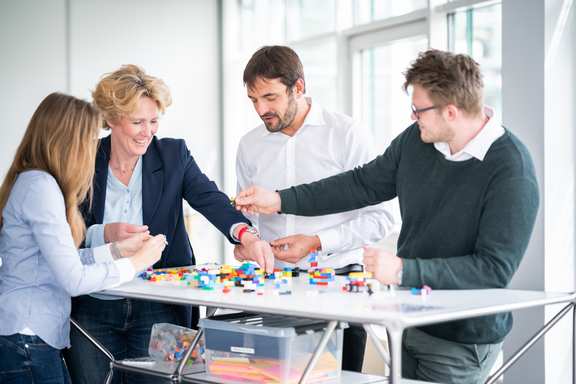 A team using design thinking to develop a prototype